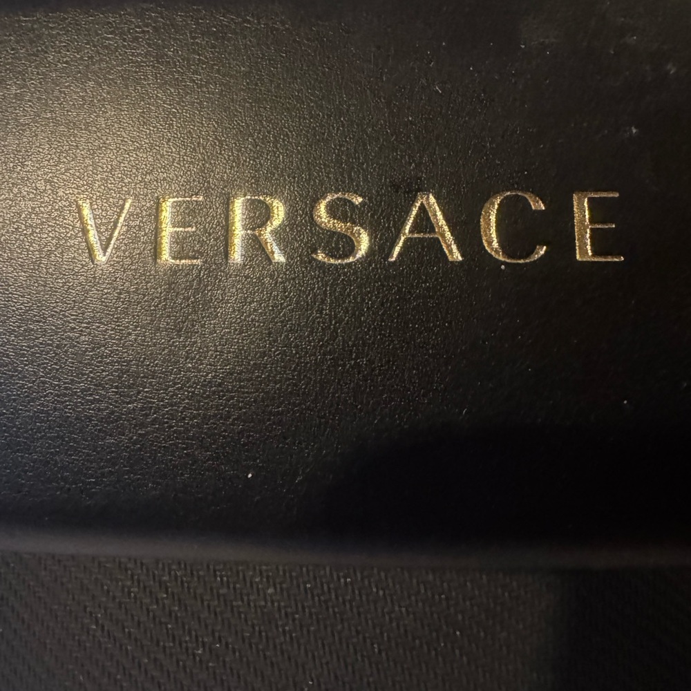Versace Black and Gold Leather Piece